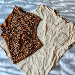 Leopardmönstrad pjamas - Säljer en pjamas med leopardmotiv. t-shirten har en fluffig ficka framtill. Perfekt som sommarpjamas🐆