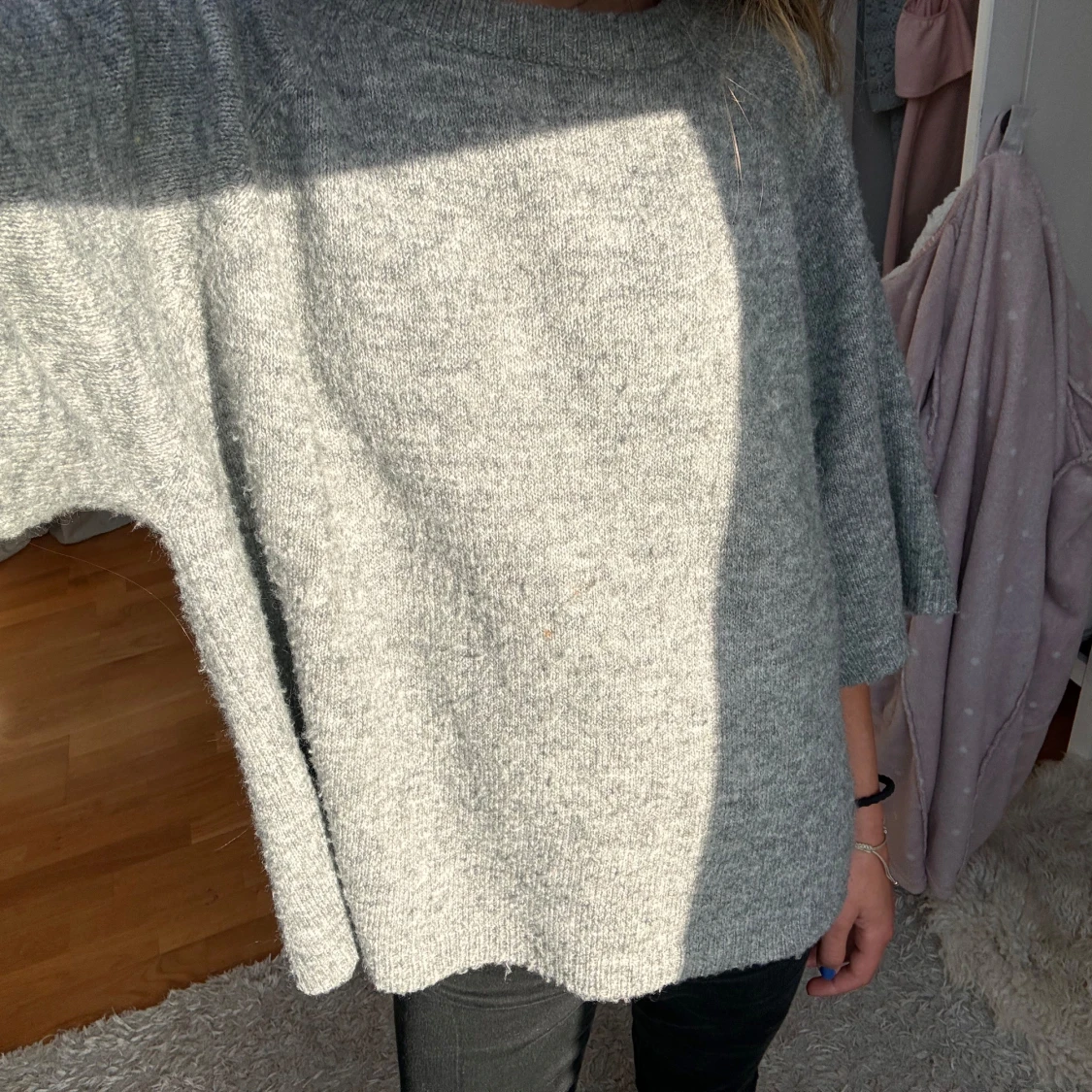 Trekvartsärmad stickad tröja