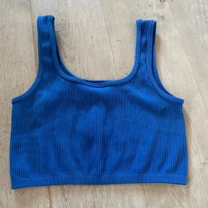 Blått linne - Blått kort linne med breda band