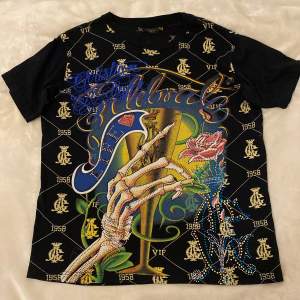 Christian Audigier T-Shirt, ingen aning vilken storlek men passar som 38/M