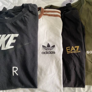 T-shirt och kofta  - Säljer min sons kläder i mycket bra skick men som inte passar längre 50 kr st för t-shirt 300 kr st för hugo boss kofta  300 kr för the north face kofta, använt två gånger, ny pris 700 kr. 100 kr björn borg tröjan. 