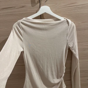 Långärmad topp  - Långärmad topp säljes Intimissimi- inspirerad