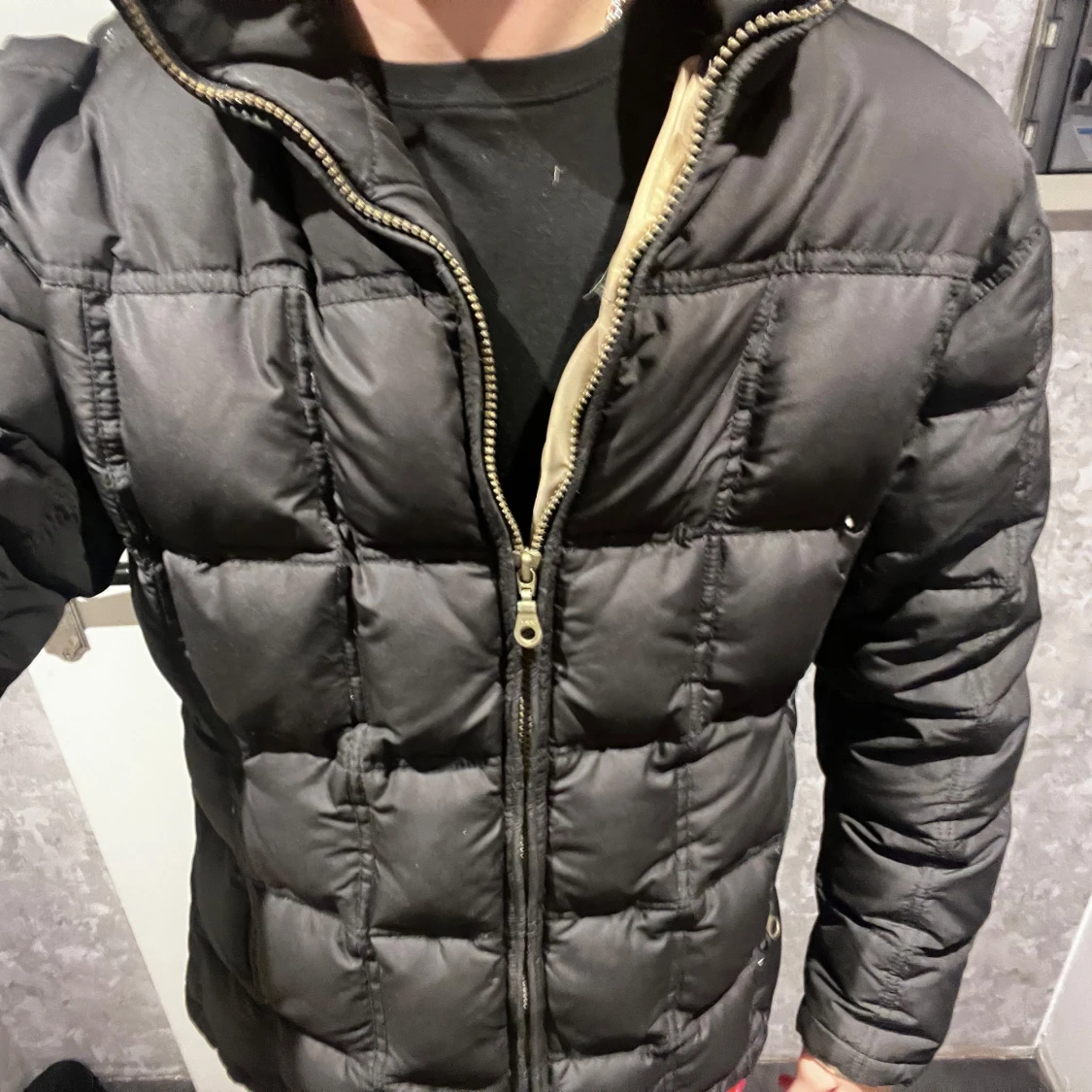 Svart pufferjacka från Camera