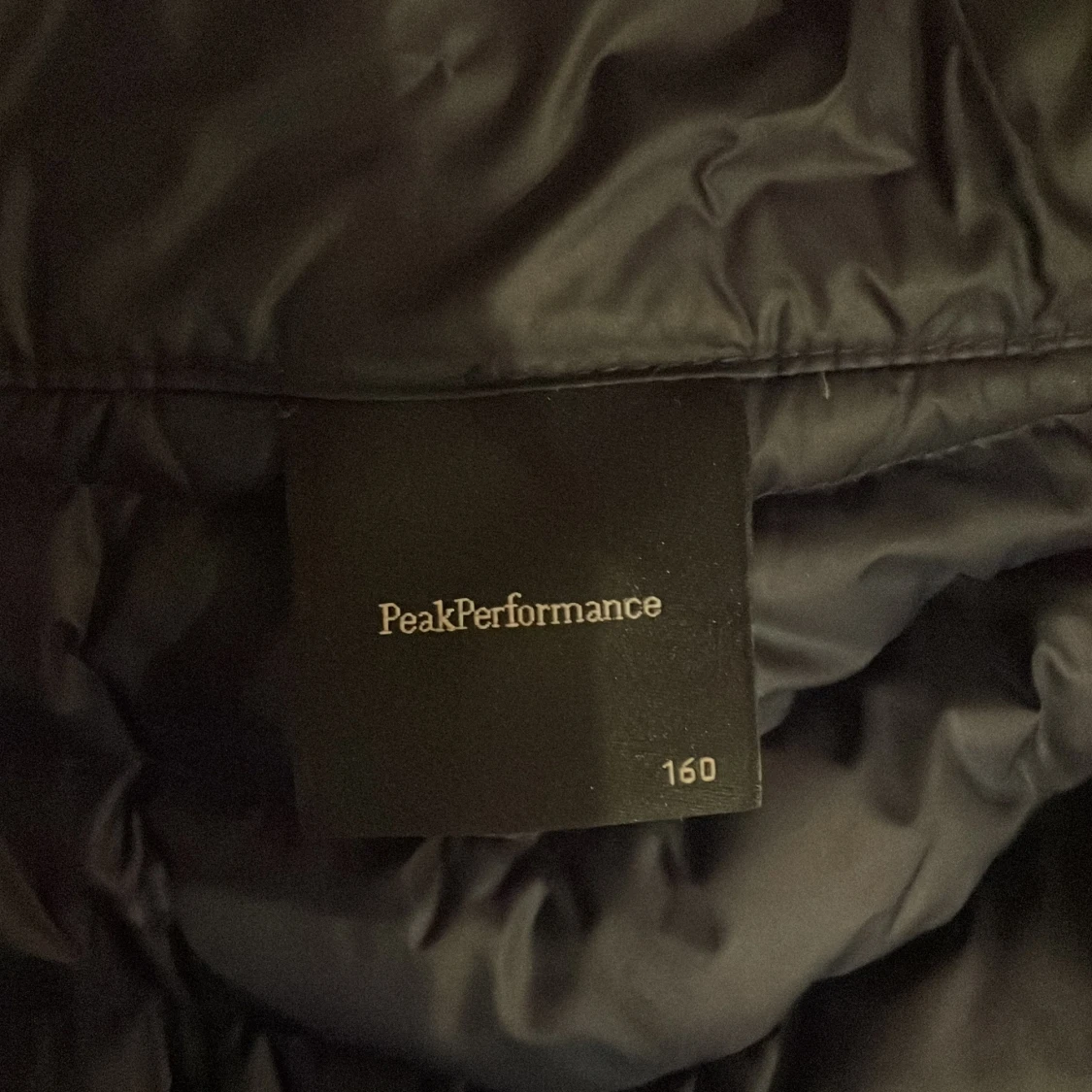 Svart dunjacka från Peak Performance - 2