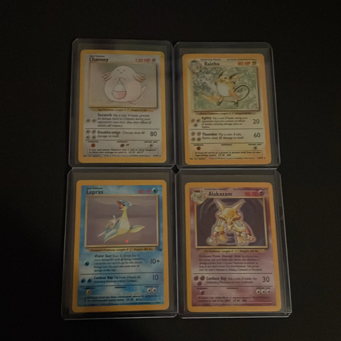 Chansey, Raichu, Lapras, Alakazam - holografiska Pokémon-kort