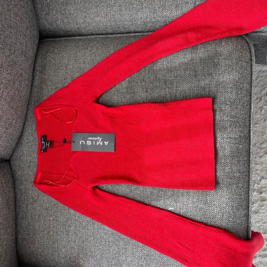 Röd glittrig tröja