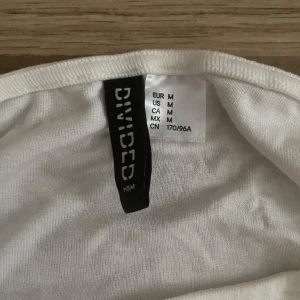 Vit Långärmad - Använd ett fåtal gånger, Storlek M men lite mindre i storlek