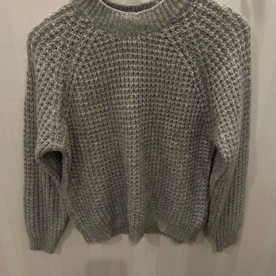 Grå stickad tröja från 157