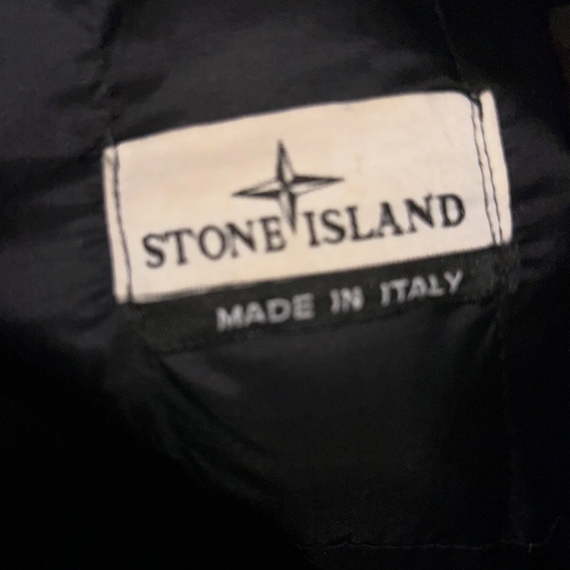 Svart pufferjacka från Stone Island - 92