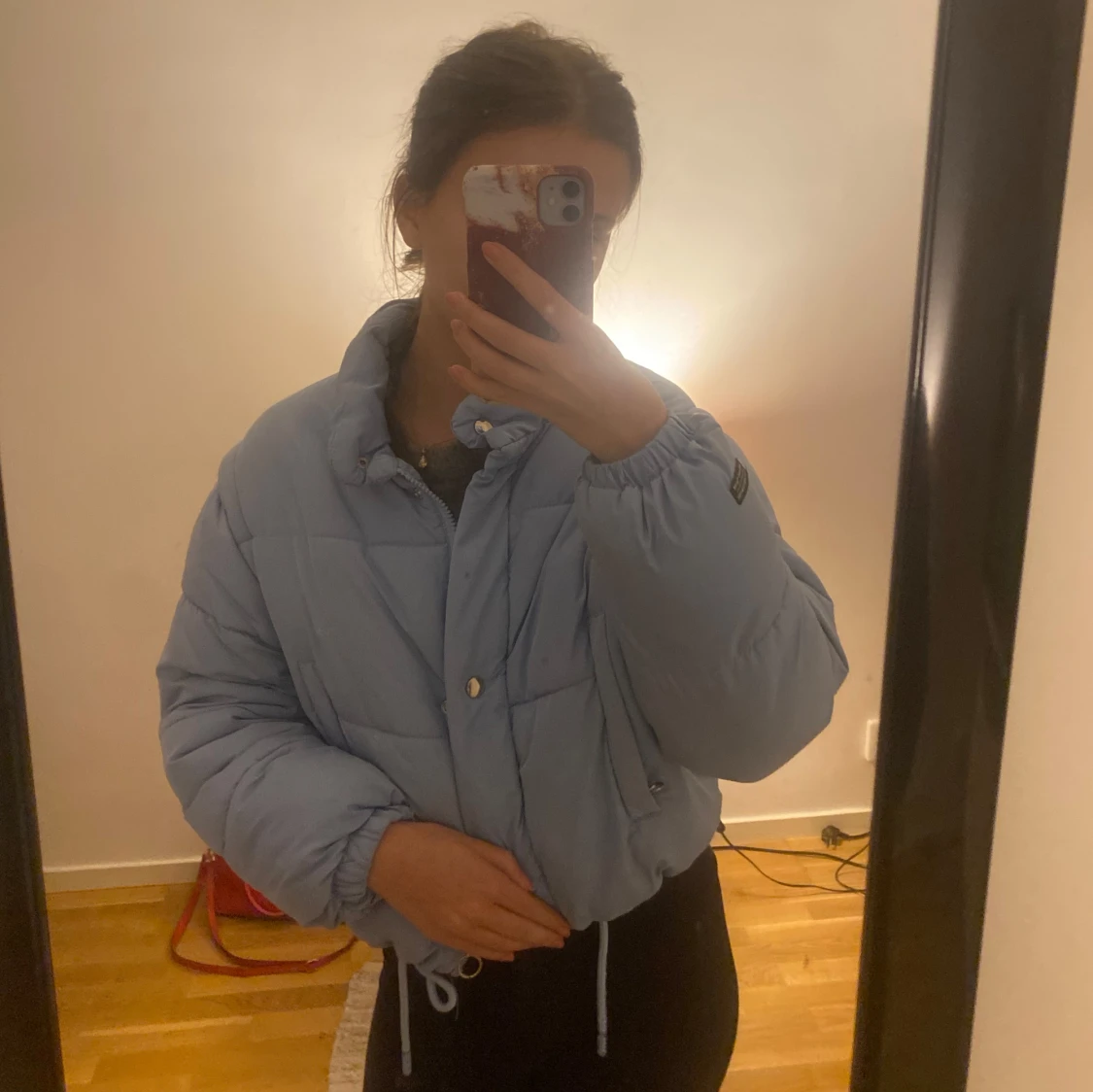 Ljusblå pufferjacka