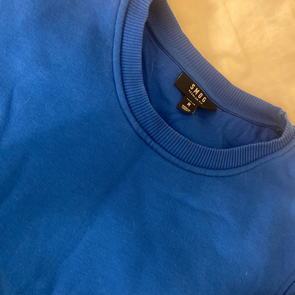 Blå tröja från SMOG - 91
