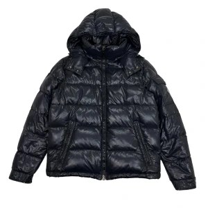 Moncler Black Maya Down Jacket - Moncler Black Maya Down Jacket  * Product Information: * Size: 2, passar M * Model:  - Pit to pit: 55cm - Shoulder width: 54cm - Sleeve Length: 62cm - Length (Collar to bottom): 64cm - Personal Ref:   * Extras: - None  * Please refer to pictures for exact condition as most items are better than listed  *  Retail Price: ~€1600  * Shipping - Every product will be shipped out same or next working day.  - Every item comes with a certificate  * References - Established 2018, with thousands of interna