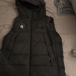 Sail Racing väst - Svart sail racing väst