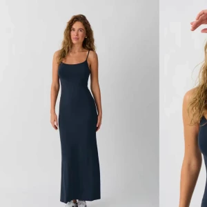 Blå maxi dress från Gina Tricot - Soft touch Ärmlös långklänning med figurnära passform. Klänningen är blå, lång och stretchig. Den har smala, reglerbara axelband och utställd nederkant.