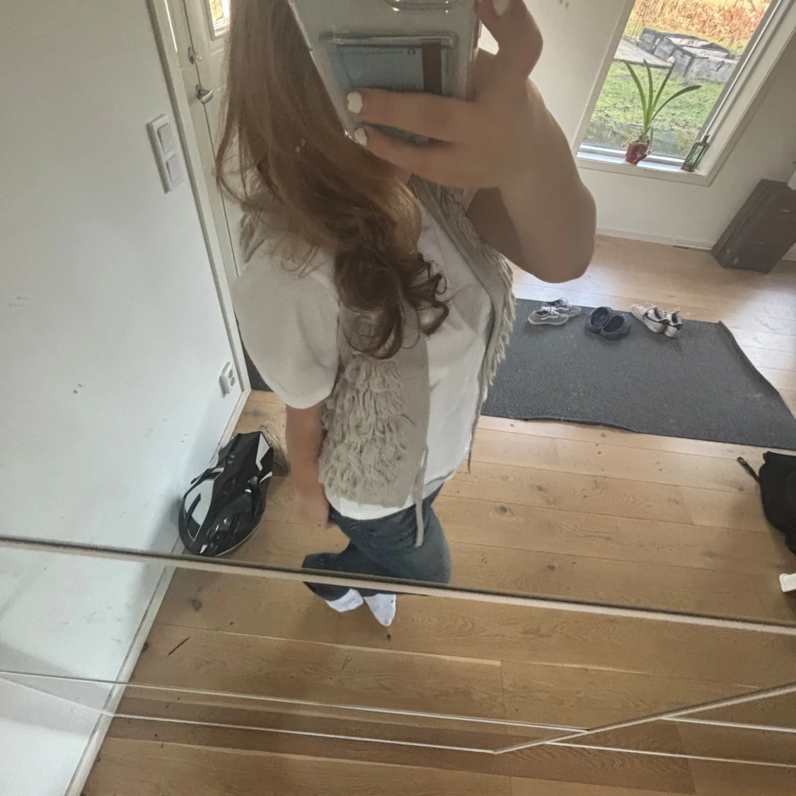 Grå stickad väst från Sleeping on Snow