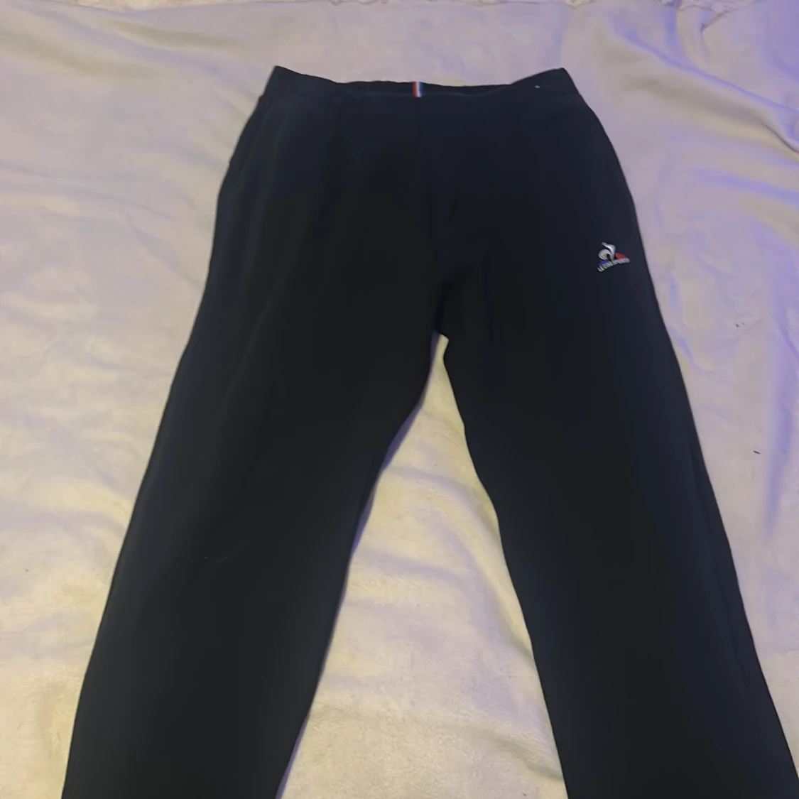 Svarta mjukisbyxor från Le Coq Sportif