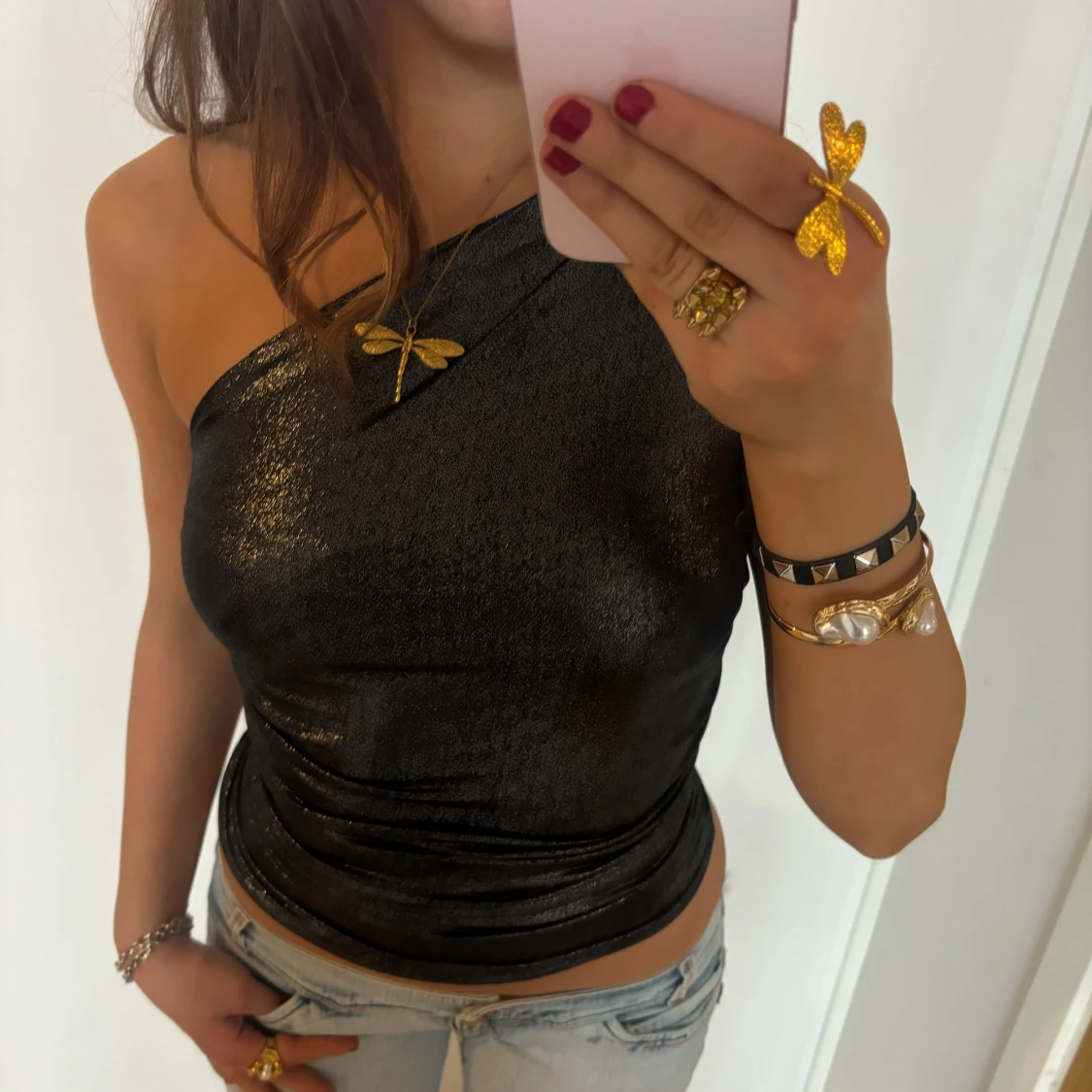 Glittrig one shoulder topp