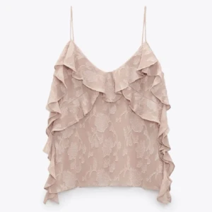 Rosa ärmlös topp med volanger - Snygg top perfekt för sommaren.Aldrig använd och inga defekter 