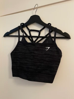 Sportbh från gymshark  - Aldrig använd. Storlek M. Nypris: 499kr 