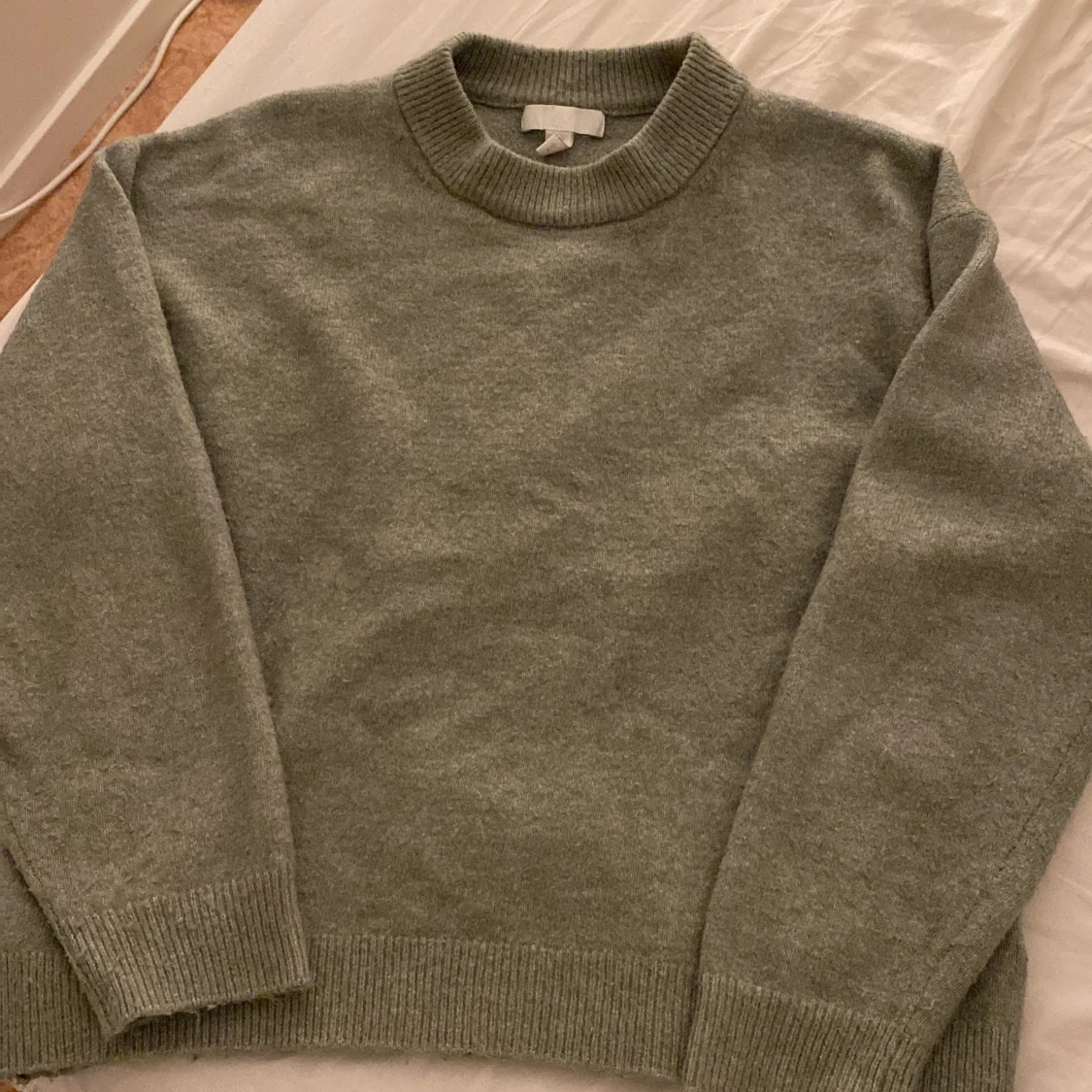 Grön stickad tröja