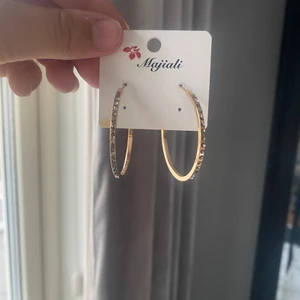 Örhängen  - Örhängen i guld