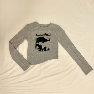 Assymetric Long Sleeve - Assymetric Long-sleeve “The Velvet Underground” from Korea. Stretchy, slightly cropped and arm sleeves are long. Worn once!