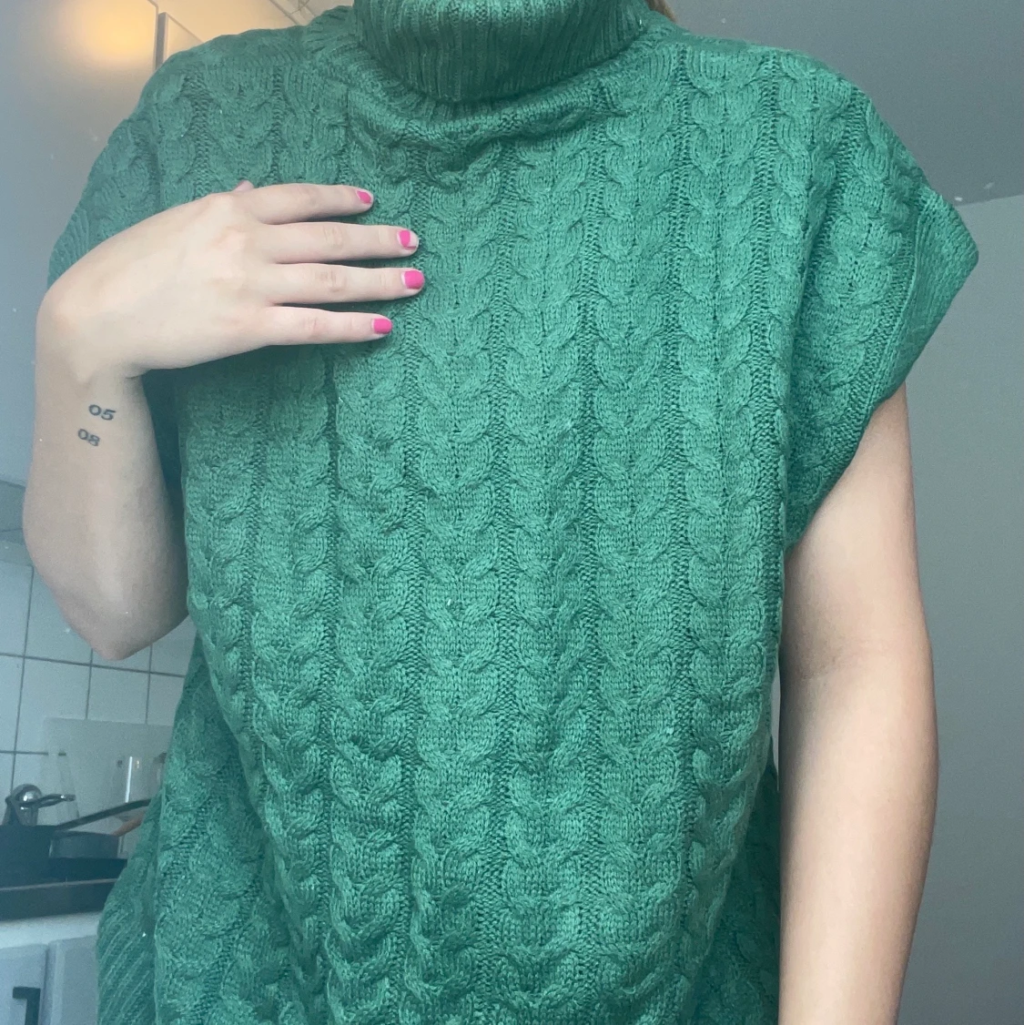 grön kabelstickad väst - 90