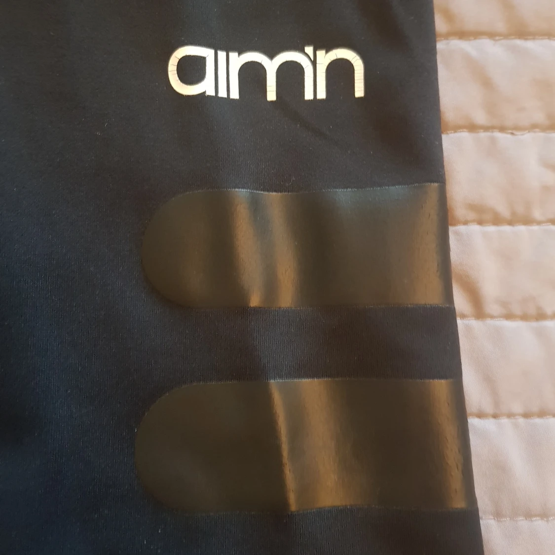 Aimn träningstights strl M