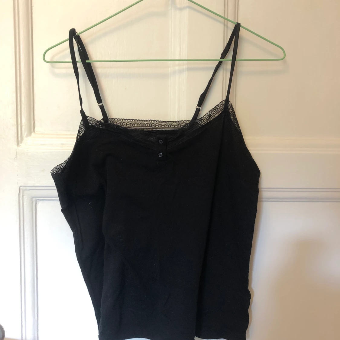 Svart linne med spets