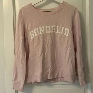 Rosa tröja i storlek xs från Bondelid.