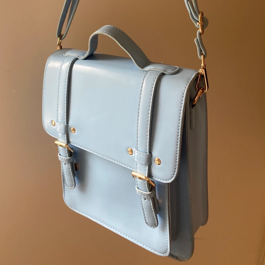 Ljusblå väska