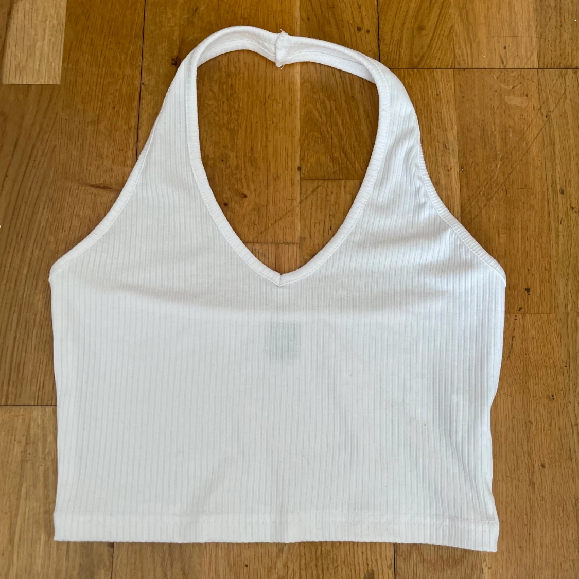 Vitt linne med öppen rygg strl XS