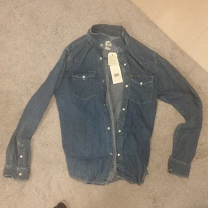 Jeansskjorta Lee storlek L - Jeansskjorta från Lee storlek L