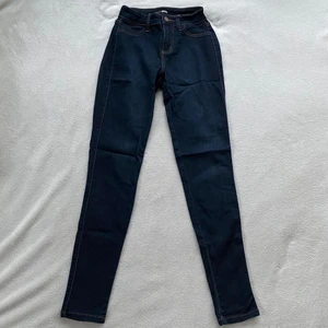 Mid Rise Skinny Jeans size XS - FashionNova ”Classic Mid Rise Skinny Jeans - Dark Denim” in size 1/XS. Used once
