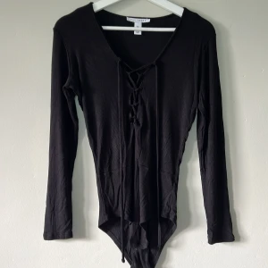 Body | Nelly - En body från nelly. Använd 1 gång.