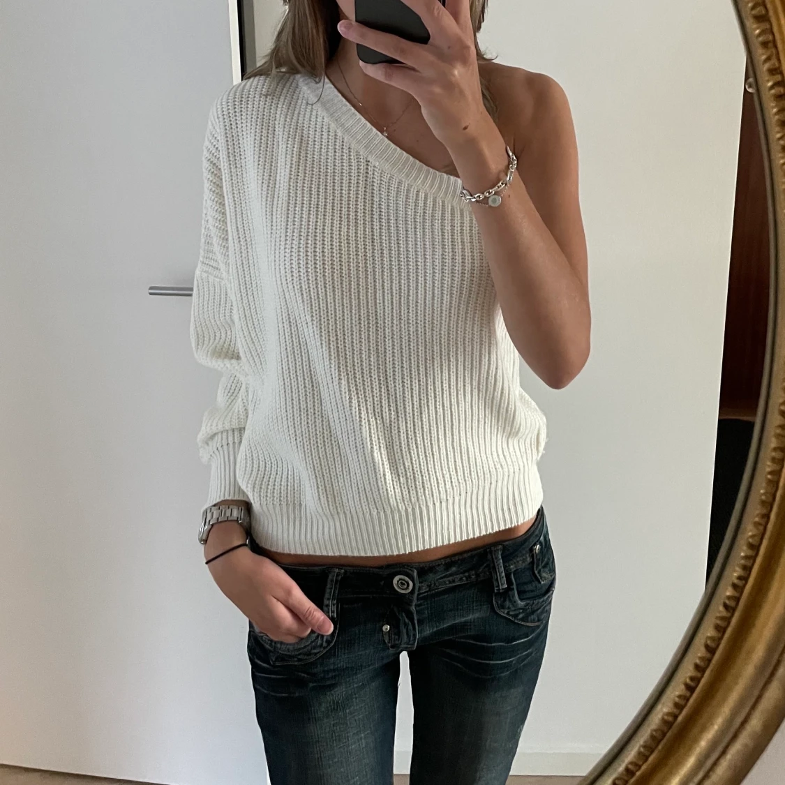 Enarmad stickad tröja 