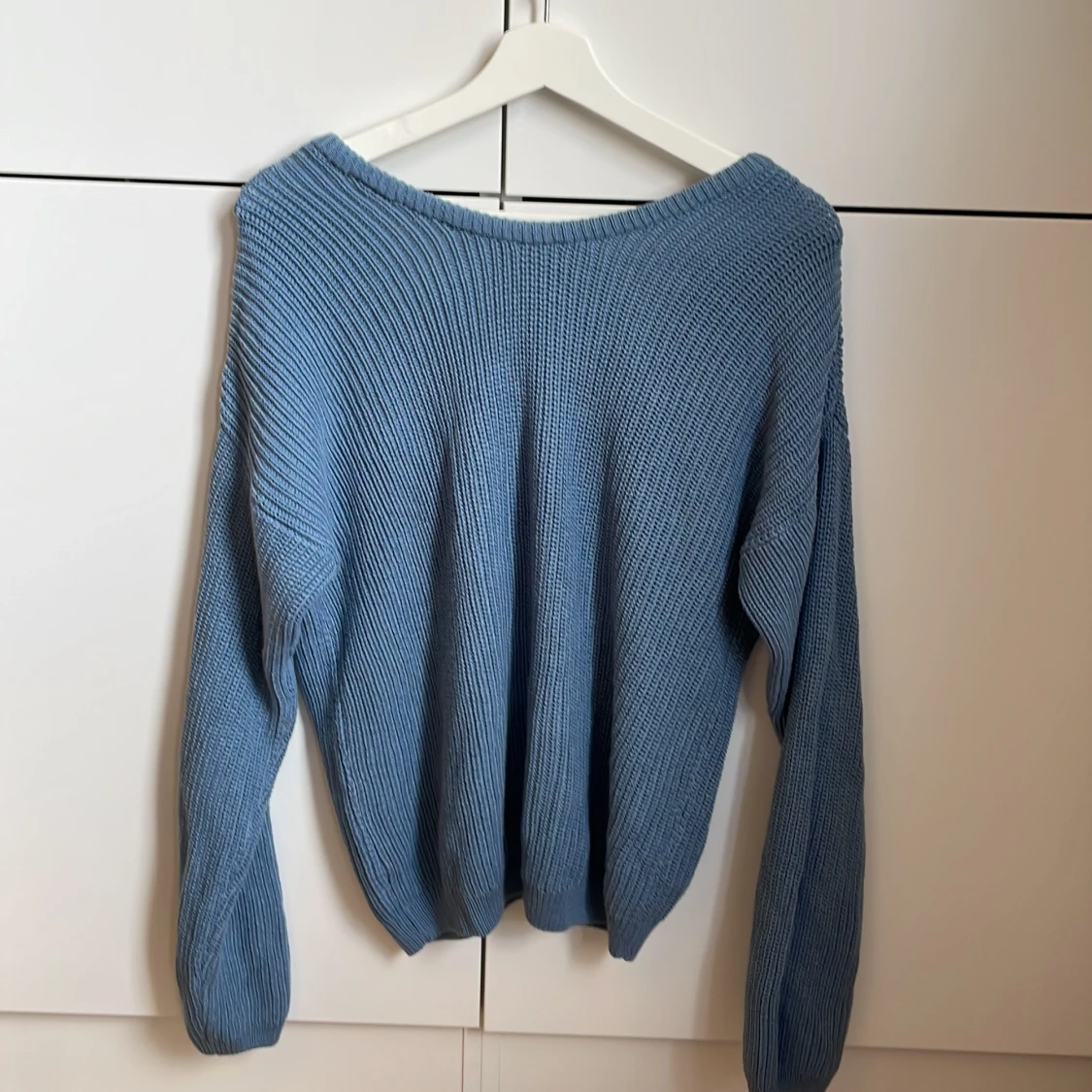 Blå stickad tröja - 90