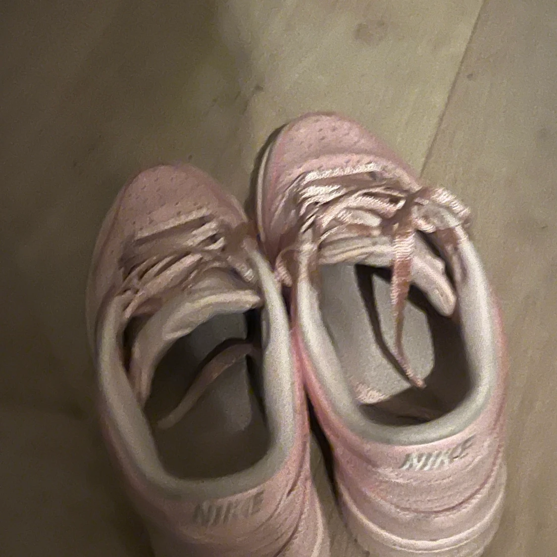  Pink Nike shoes   - 90