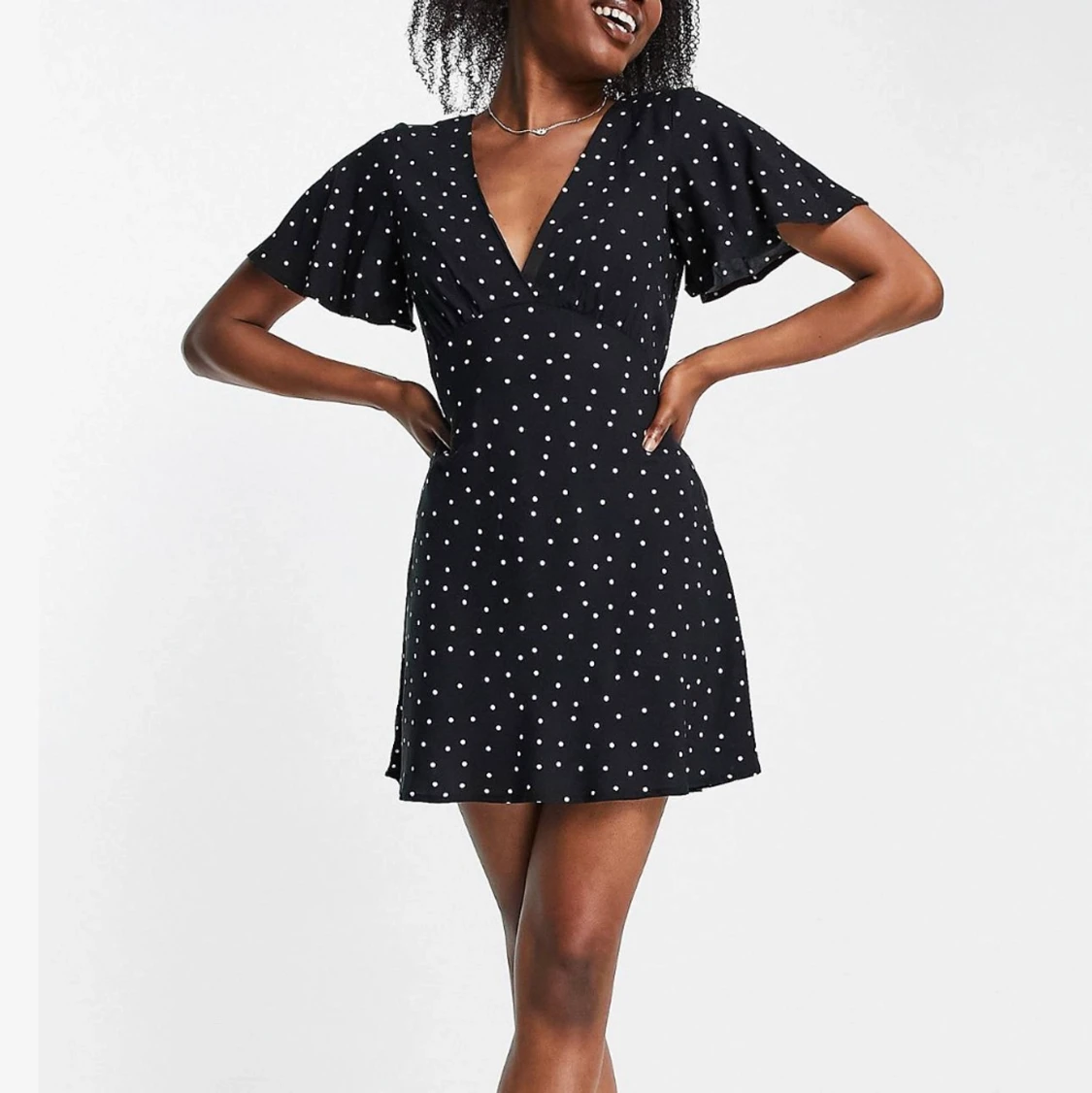 Stradivarius prickig klänning i storlek M