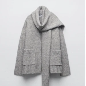 Grå kofta - Aldrig använd,  En kofta som inte kommit till användning