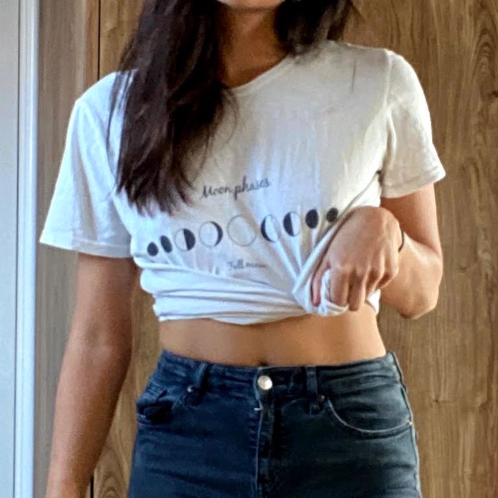 White crop top size s from urban outfitters with graphic . T-shirts.