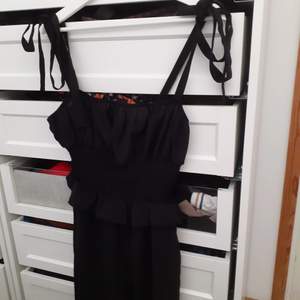 Black jumpsuit with ruched on the chest and back with adjustable straps  -Size L Never worn