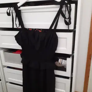 Black jumpsuit with ruched on the chest and back with adjustable straps  -Size L Never worn