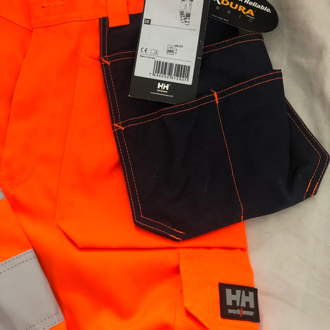 Oranga varsel/ arbetarbyxor