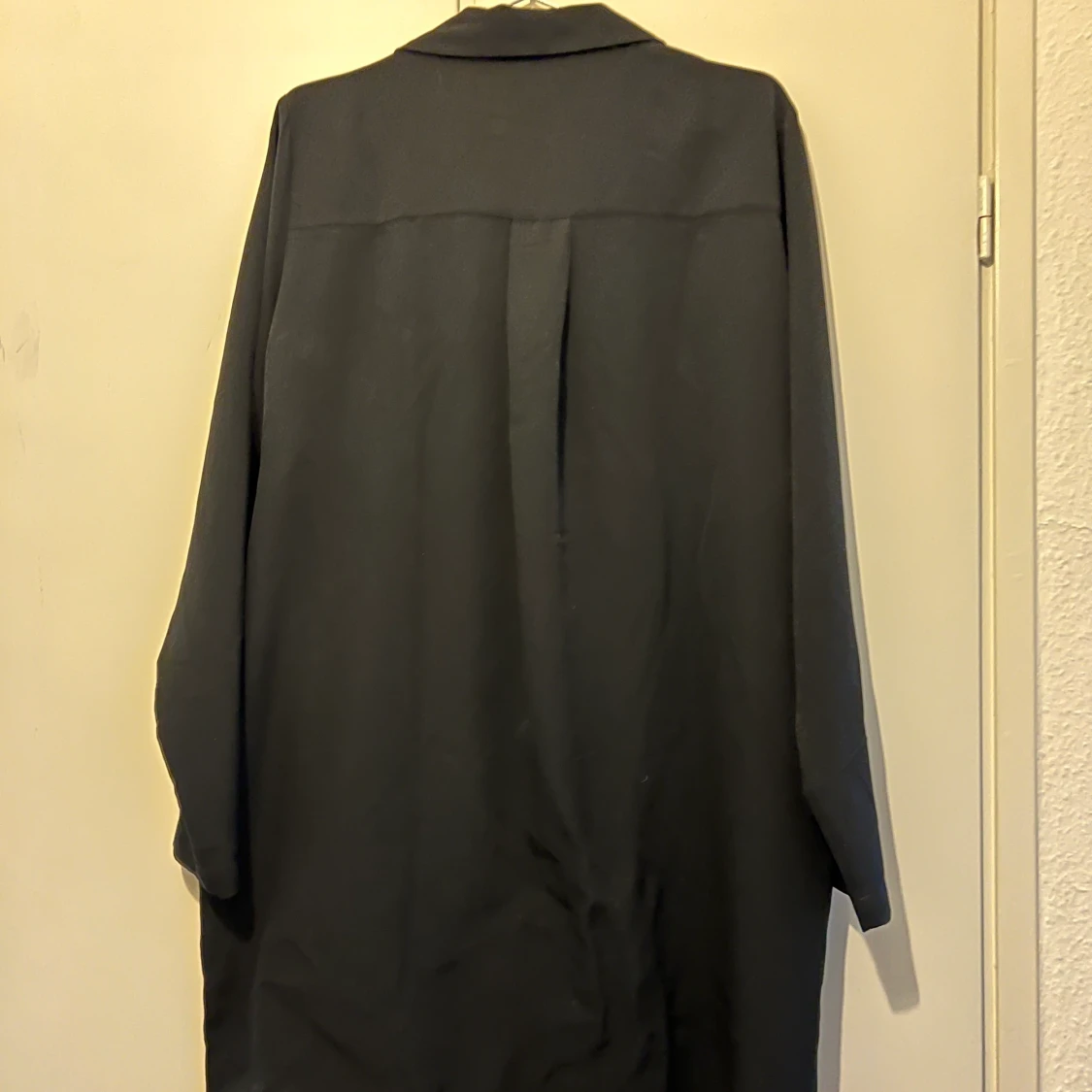 Svart kavajklänning med fickor - 90