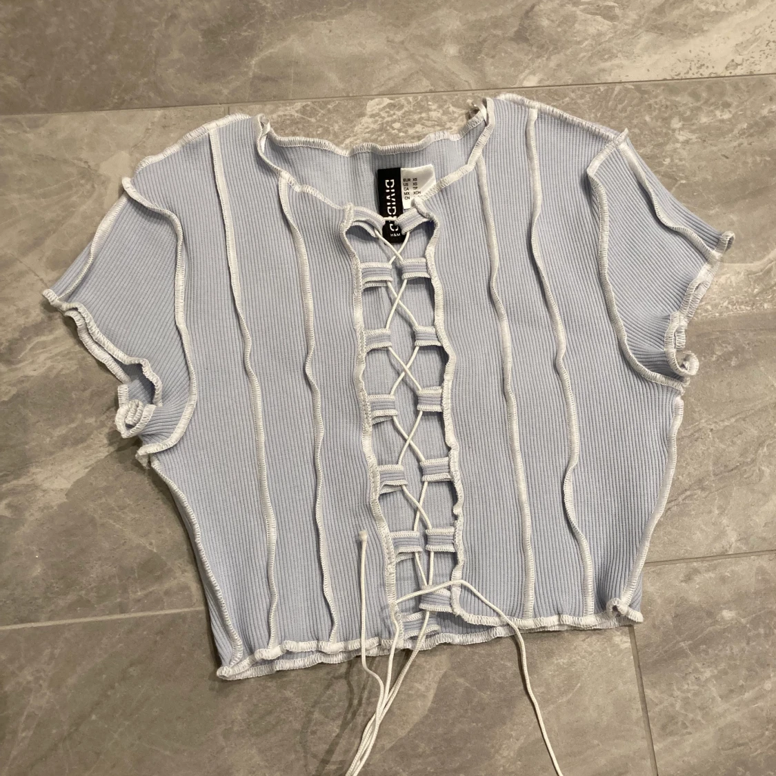 Oanvänd topp HM Divided