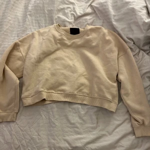 Collegetröja  - Storlek M från lager 157