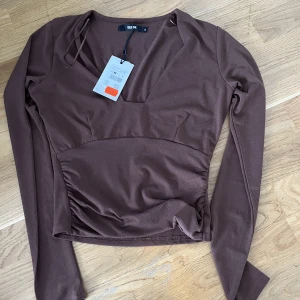 Topp - Aldrig använd. Köpt för 150 kr säljer för 50 kr