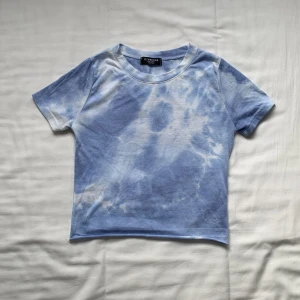 Sky shirt - Sky cropped top from Korean brand called Ozbridge. Stretchy and soft. Fits tight and cropped. Fits XS-S. Worn 3 times.