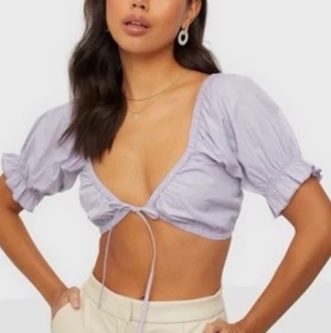 Nelly - Helt ny, med lappar kvar.